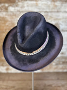 Weathered violet-charcoal felt Gus hat with pencil curl brim, lilac petersham grosgrain ribbon, rhinestone band, hand stitching, and diamond brand mark.