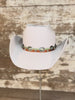 Video of cowboy hat with a brick-style crown and come-and-go brim, finished with a smooth leather hat band and silver conchos.
