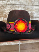 Back view of felt hat in deep red-brown with coffin crown, relaxed taco brim, Pendleton wool band, horsehair tie, Columbia Plateau sunburst beading, and vintage African trade beads.