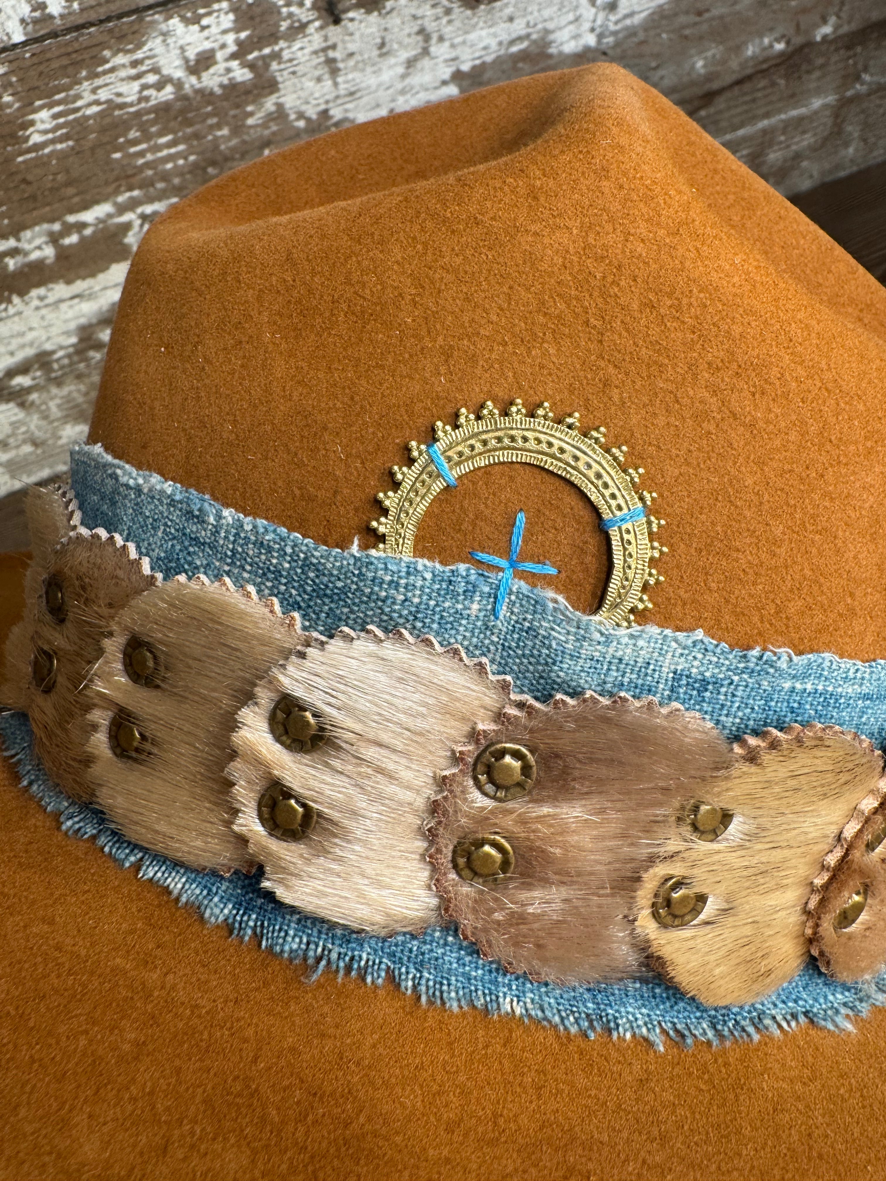 Detail of Solar Communion reclaimed beaver felt hat with denim and fur band, hand-shaped with brass sun detail and wide brim, crafted in Oregon.