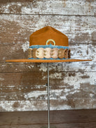 Front view of Solar Communion hand-shaped reclaimed beaver felt hat with denim-and-fur band and brass solar accent, handmade in Oregon